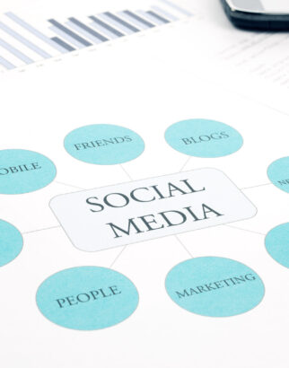 Social Media business concept flow chart. Pen, touchpad, smartphone background Social Media network business, concept flow chart. Pen, tablet touchpad and smartphone on background. Blue Toned
